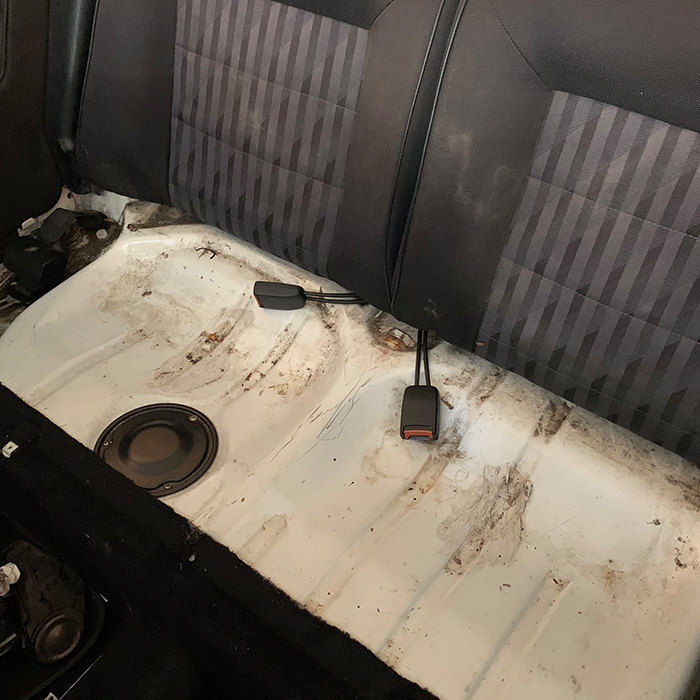 Remove the rear seat on a Mk1 Golf